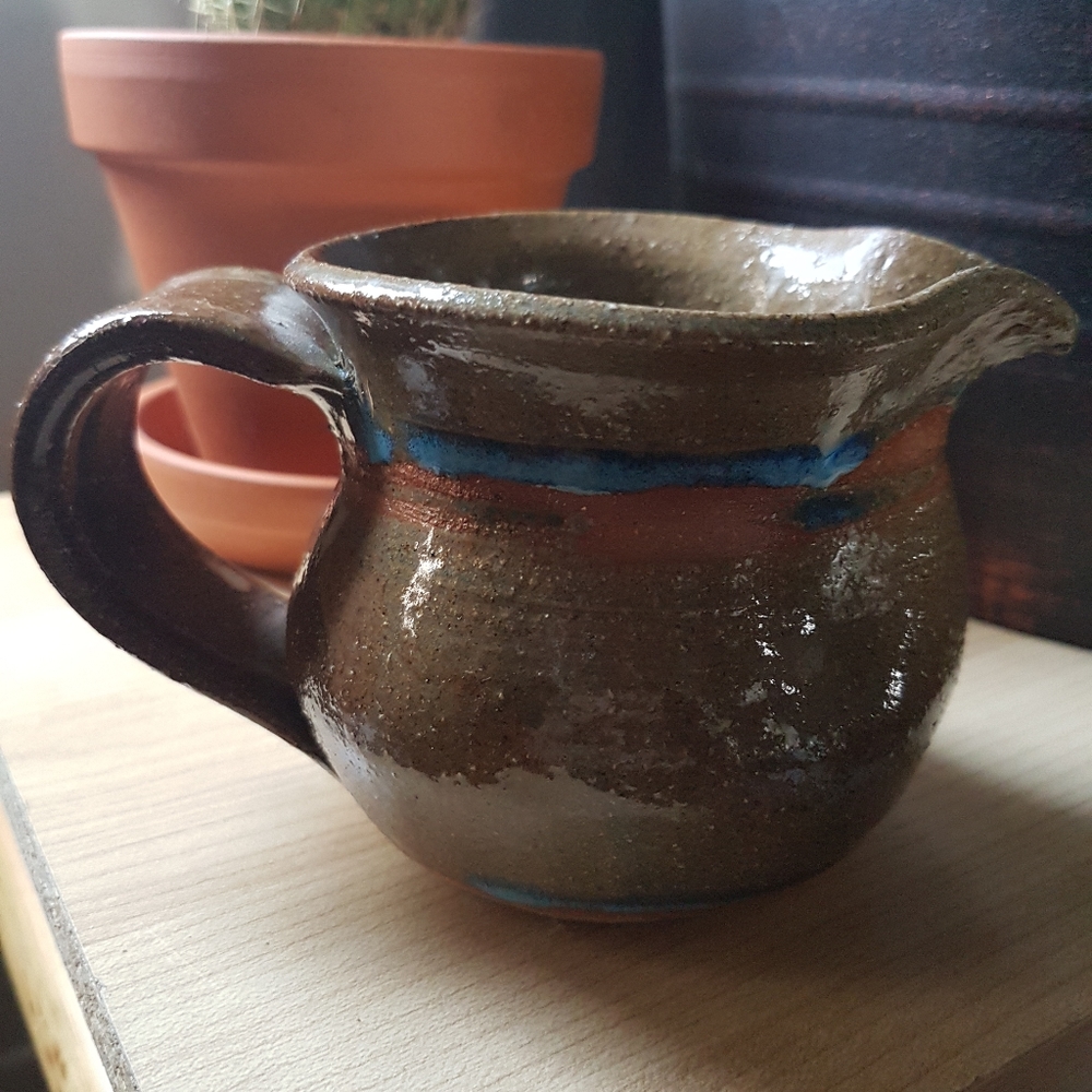 Vintage clay pottery creamer